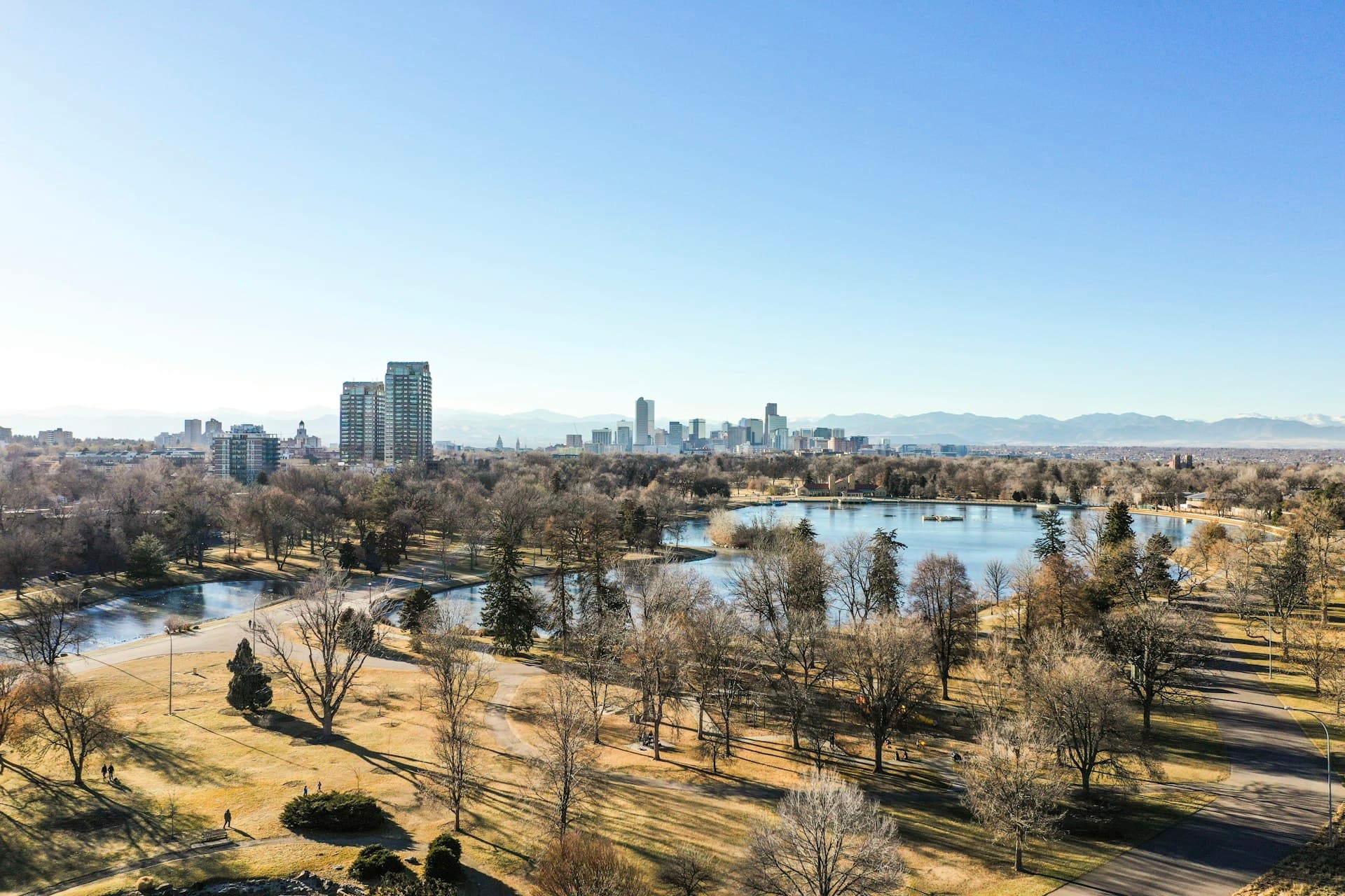 Denver skyline at golden hour with Rocky Mountains